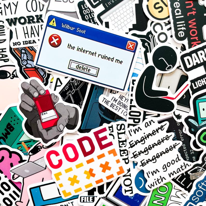 Op de afbeelding: Een verzameling kleurrijke stickers met diverse ontwerpen en tekst. E&eacute;n sticker lijkt op een computerfoutmelding met de tekst "the internet ruined me". Andere stickers tonen de woorden "CODE", "SLEEP NOT" en "I'm an Engineer."