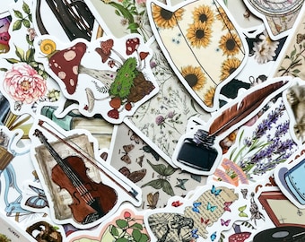 May include: A collection of decorative stickers featuring various designs. The stickers include illustrations of mushrooms, sunflowers, a violin, butterflies, flowers, a quill and inkwell, and a vintage record player. The color palette includes shades of brown, beige, and various colors.