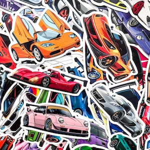 May include: A collection of colorful car stickers featuring various sports car designs. The stickers showcase a variety of car models in shades of orange, red, pink, silver, and blue. Some cars have their doors open.