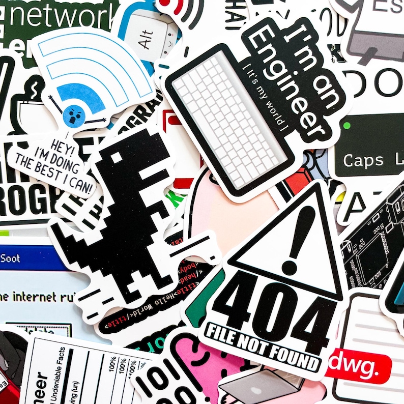 Op de afbeelding: Een verzameling kleurrijke stickers met diverse ontwerpen en tekst. Stickers bevatten een toetsenbord, een Wi-Fi-symbool, een dinosaurus en de tekst "I'm an Engineer" en "404 File Not Found".