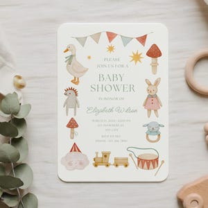 May include: A baby shower invitation with a whimsical design. The invitation features illustrations of a duck, rabbit, and other charming elements. The text reads "Baby Shower" and includes event details. The overall color palette is soft and pastel.