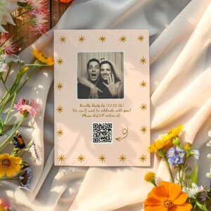 May include: A pink wedding invitation with gold star details and a black and white photo of a couple. The invitation includes the text "Kindly Reply by [02.02.26]" and a QR code for online RSVP.