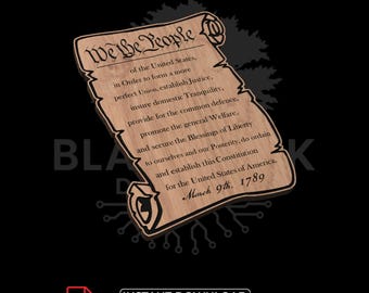 May include: A wooden scroll with the text "We the People" and the preamble to the U.S. Constitution. The scroll is light brown with dark brown edging and text. The words "Instant Download" and "For Personal and Commercial Use" are also visible.
