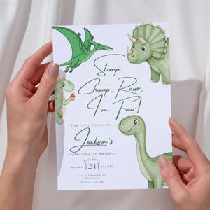 May include: A white invitation card with green dinosaur illustrations and the text "Stomp, Chomp, Raw, I'm Four!" The card includes the text "Jackson's Gathering At Smith's" and the date "December 24".