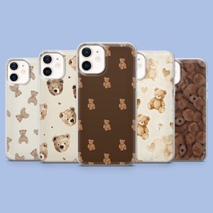 May include: A collection of five phone cases with various teddy bear designs. The cases feature different backgrounds, including cream, brown, and a pattern of teddy bears. The teddy bears are in shades of brown and beige.