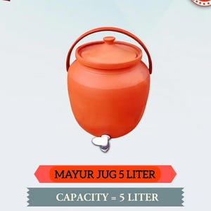 May include: A terracotta-coloured water jug with a lid and a handle. The jug has a spigot at the bottom and the text "MAYUR JUG 5 LITER" and "CAPACITY = 5 LITER" are displayed below the jug.