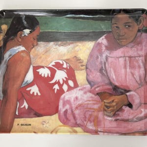 May include: A rectangular serving tray featuring a reproduction of a Paul Gauguin painting. The artwork depicts two individuals sitting on a light-colored surface, one wearing a white and red patterned garment and the other in a solid pink dress.
