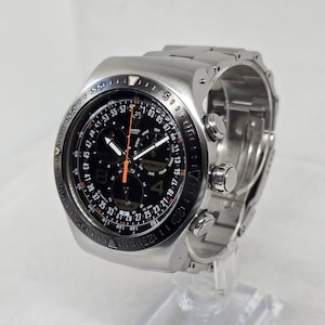 Swatch Irony Chrono "Real Man" (YOS417G) Watch | 47mm Stainless Steel | Black Dial & Orange Accents |
