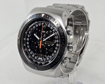 Swatch Irony Chrono "Real Man" (YOS417G) Watch | 47mm Stainless Steel | Black Dial & Orange Accents |