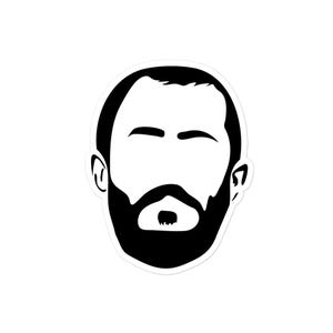 May include: A black and white sticker showing a simplified illustration of a man's face. The design includes a full beard, mustache, eyebrows, and the outline of the head.