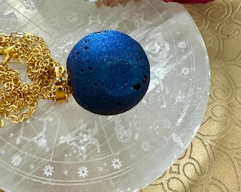 Blue Pendulum Necklace (Looks like the Moon with crystals in the craters)