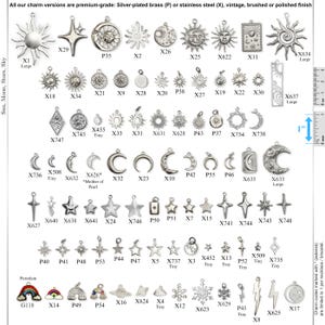 May include: A collection of silver-toned metal charms featuring sun, moon, and star motifs, along with rainbows and lightning bolts. Each charm is labeled with a code. A vertical ruler on the right shows a 1-inch scale for size reference.