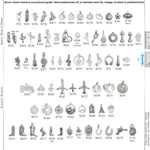 May include: A collection of silver-toned metal charms arranged in rows, categorized by themes like sports, music, and travel. Each charm features a unique shape, including musical notes, vehicles, and sports equipment, with a 1-inch scale reference.