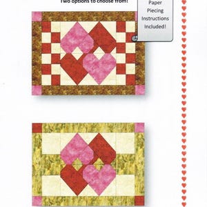 May include: A paper pattern for Valentine's Day placemats. The design features two options with heart-shaped patterns in red and pink, surrounded by a border. The text reads "Calendar Placemats February Love" and includes paper piecing instructions. The placemats measure 12.5" x 18.5".