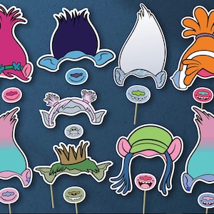 May include: A white ceramic mug with a black handle and the text "But First, Coffee" in a bold, black font. The mug is set against a blurred background, suggesting a cozy setting.