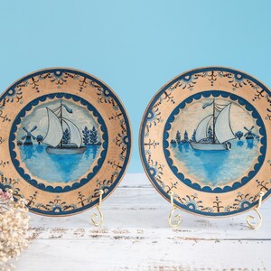 Hand-Painted Porcelain Wall Plates, Dutch Sailboat and Windmill Scene, 1985 Dated Pair