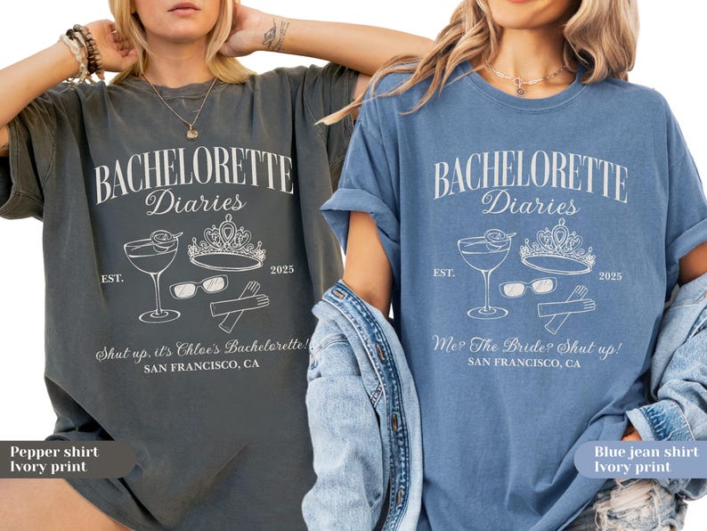 May include: Two t-shirts, one pepper-colored and one blue, each with a white graphic. The graphic includes the text "BACHELORETTE Diaries" with a cocktail, crown, sunglasses, and gloves. The text "Shut up, it's Chloe's Bachelorette!" and "Me? The Bride? Shut up!" are also included.