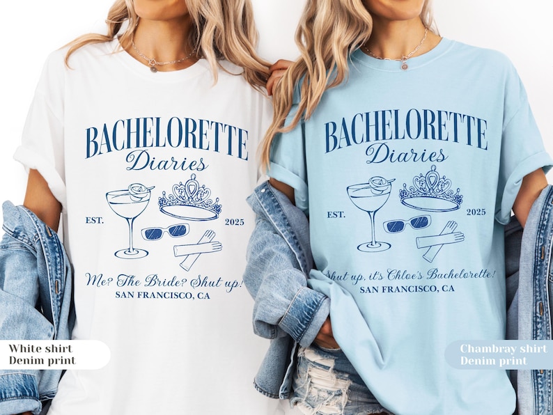 May include: Two t-shirts, one white and one light blue, with a navy blue graphic. The graphic includes the text "BACHELORETTE Diaries", a cocktail, a crown, sunglasses, gloves, and the text "SAN FRANCISCO, CA".