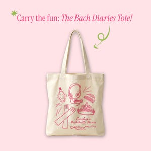 May include: A cream-colored tote bag with pink illustrations of a perfume bottle, headphones, comb, crown, gloves, and text that reads "Carry the fun: The Bach Diaries Tote!" and "Caroline's Bachelorette Diaries."