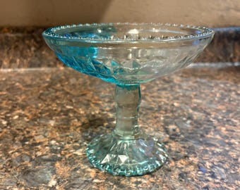 Vintage distressed blue glass candy dish