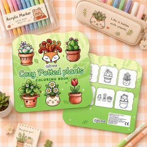 Op de afbeelding: Een verzameling kunstbenodigdheden en briefpapier. De afbeelding toont een kleurboek met de titel "Cozy Potted Plants", een etui met een plantenontwerp en een set acrylmarkers. Het kleurboek bevat illustraties van potplanten.