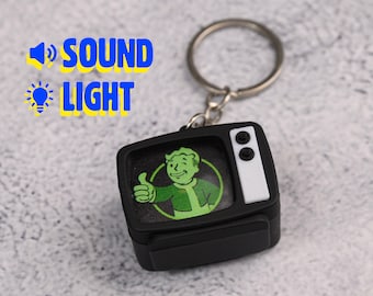 Llavero de TV de Fallout Vault Boy / Accesorio de TV con luz y sonido / Regalo coleccionable para gamers y cosplay