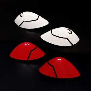 Asuka Langley and Rei Ayanami Hair Clip Interface Headset Set inspired by Neon Genesis Evangelion. Fan-made 3D printed cosplay prop accessories with glossy red and white finish, detailed black panel lines, and durable metal hair clips. Perfect for Evangelion cosplay, anime conventions, photoshoots, costume accessories, display collections, fan gifts, and collectors. Unofficial handmade accessory inspired by the iconic anime series.