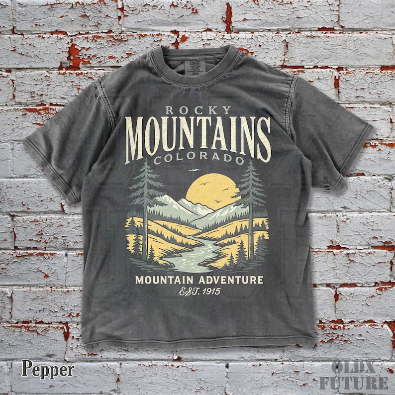 🌄 Step into nature’s vibe with this Rocky Mountains Colorado vintage graphic tee! Inspired by retro mountain adventure aesthetics, this Comfort Colors shirt brings washed, lived-in softness and a relaxed oversized fit — perfect for both men and women. 🌲

🖤 100% cotton, DTG printed with premium inks that won’t fade easily. Whether you love hiking, retro graphics, or just chill oversized outfits, this tee adds a timeless touch to your wardrobe.