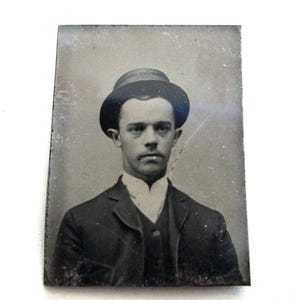 antique small tintype photo - 1800s, man with hat, stick out ears, mustache