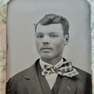 antique miniature gem tintype photo - 1800s, handsome young man with mustache, dimple, plaid bow tie, tinted cheeks
