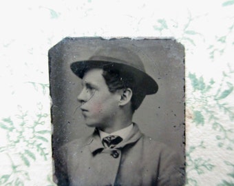 antique miniature gem tintype photo - 1800s, profile of a young man wearing a hat