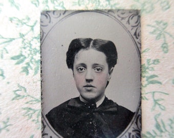 antique miniature gem tintype photo - 1800s, young girl with big eyes, tinted cheeks, floral frame