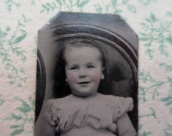 antique miniature gem tintype photo - 1800s, smiling young girl sitting in a chair, dress off the shoulders, tinted cheeks