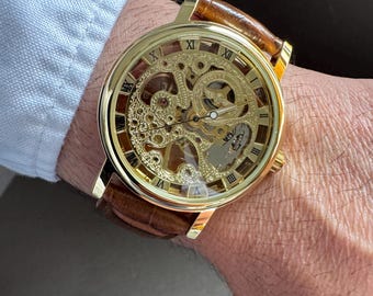 Orologio meccanico scheletrato: oro, cinturino in pelle marrone, unisex