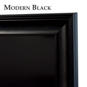 Pode incluir: Close-up de uma moldura preta com o texto "Modern Black" no topo. A moldura tem uma superfície texturizada e uma borda chanfrada, com um interior preto sólido.