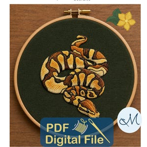 May include: An embroidery hoop containing dark green fabric with a stitched ball python in shades of yellow, orange, and brown. A yellow flower is stitched in the upper right. The text reads Maile Alicia Designs and PDF Digital File.