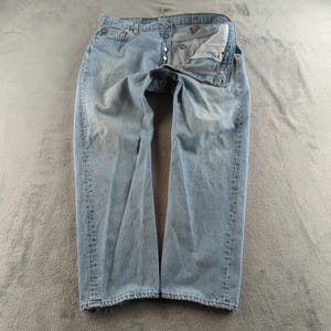 Vintage des années 90 Levis 501 Jeans 40 x 30 bleu délavé clair Patchwork bouton braguette Made USA