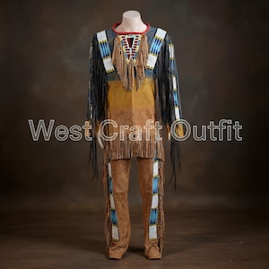May include: A Native American-style outfit with a tan and brown color scheme. The top features fringe, beadwork, and a geometric design. The pants have matching fringe and beadwork. The text "West Craft Outfit" is visible.