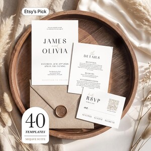 May include: A wedding invitation suite with a minimalist design. The suite includes an invitation, details card, RSVP card, and an envelope with a wax seal. The text reads "JAMES and OLIVIA" and "SATURDAY, JUNE 27th 2026". The suite is presented on a wooden tray.