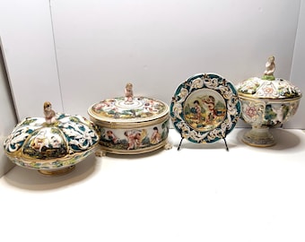 Lote de 4 querubines "Putti" de porcelana Capodimonte italiana vintage pintados a mano con detalles dorados.