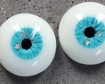 Ojos de uretano de color azul cielo natural de 12 mm con diamantes