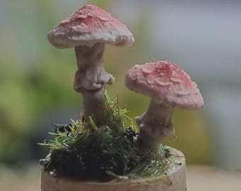 Miniature sculpture of mushrooms in the pot