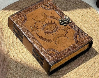 Diario de cuero con diseño de mal de ojo / Grimorio de sol y luna, candado vintage (18 x 13 cm)