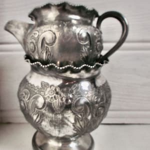 Antique Chased Silver Creamer and Sugar Bowl Set