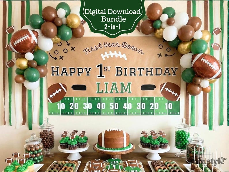 May include: A football-themed first birthday party setup with balloons, a banner, and treats. The banner reads "Happy 1st Birthday Liam" with a football field design. Decorations include football-shaped balloons and cupcakes.