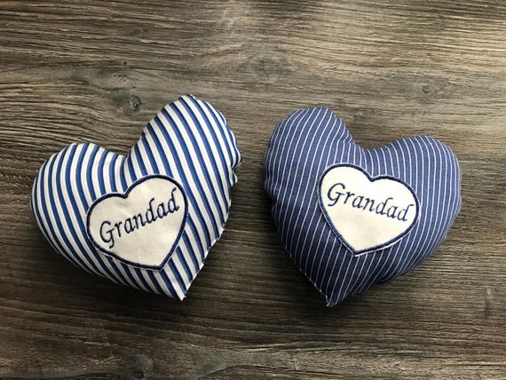 A tiny heart cushion sewn from a loved one's actual clothing — 50 favorites signal real demand for this deeply personal, irreplaceable keepsake.