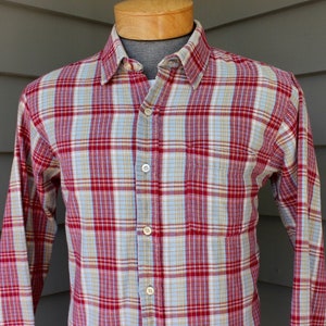 vintage 1970&#39;s -Arrow- Men&#39;s long sleeve Flannel Shirt.  Red & Pale Gray Plaid w/ Gold and Light Blue stripes - 100% Cotton. Medium - Large
