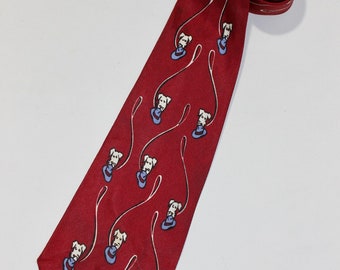 vintage 40's - 50's -no maker label- Men's neck tie. 'Terrier with fedora on a leash' print. Dark Red twill. Marked -Stanton-