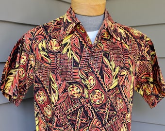 vintage 1940's 'Paradise Sportswear' Men's Hawaiian shirt.  Bold tribal print w/ Monstera leaves - Orange, Yellow, & Brown - Cotton. Medium