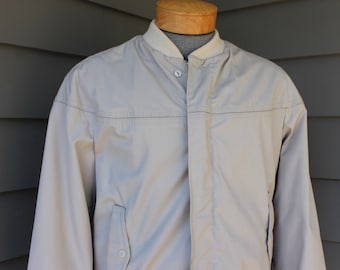 vintage 1960's -VIP Sportswear- "Derby" jacket. Made for 'National Shirt Shops'. Beige with plaid flannel body lining.  Medium